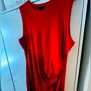 Pretty red knit sheath dress with side ruching and a crew neckline.